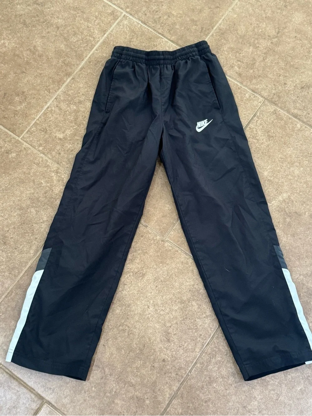 Nike Black Joggers with White Logo and Side Accents